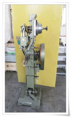 Rotary riveting machine